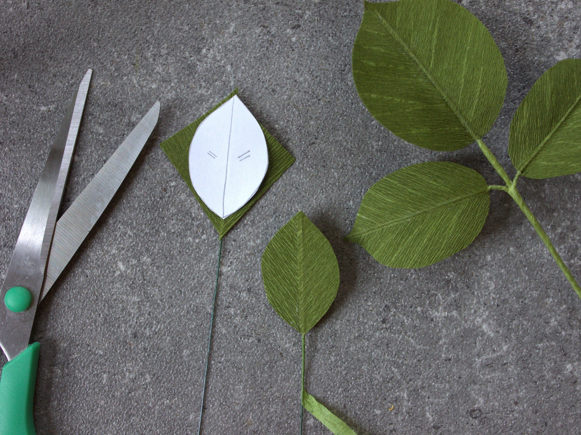 Paper rose leaf being made